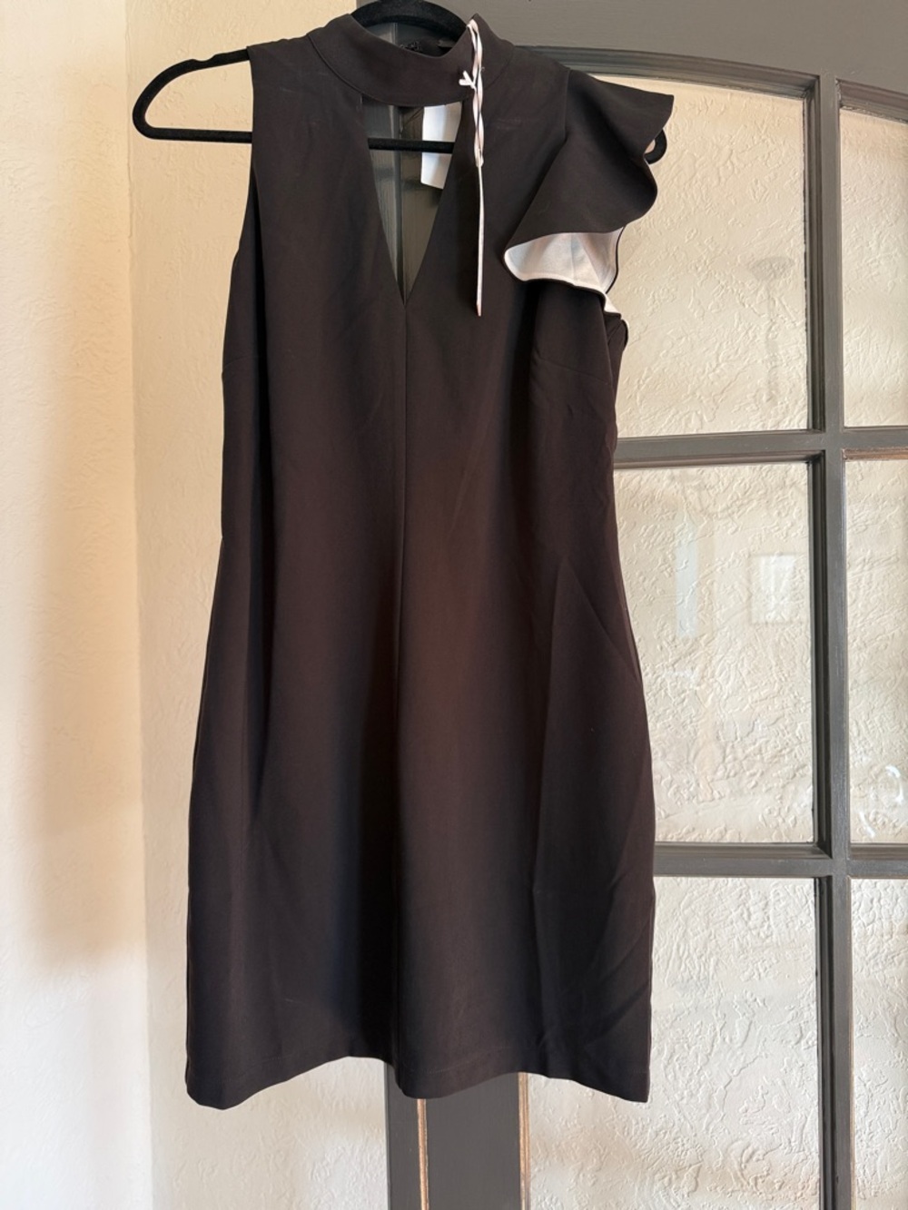 Adelyn Rae Black Mini Dress with Ruffle Shoulder